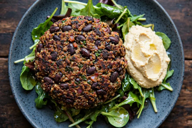 Black bean veggie burger with greens